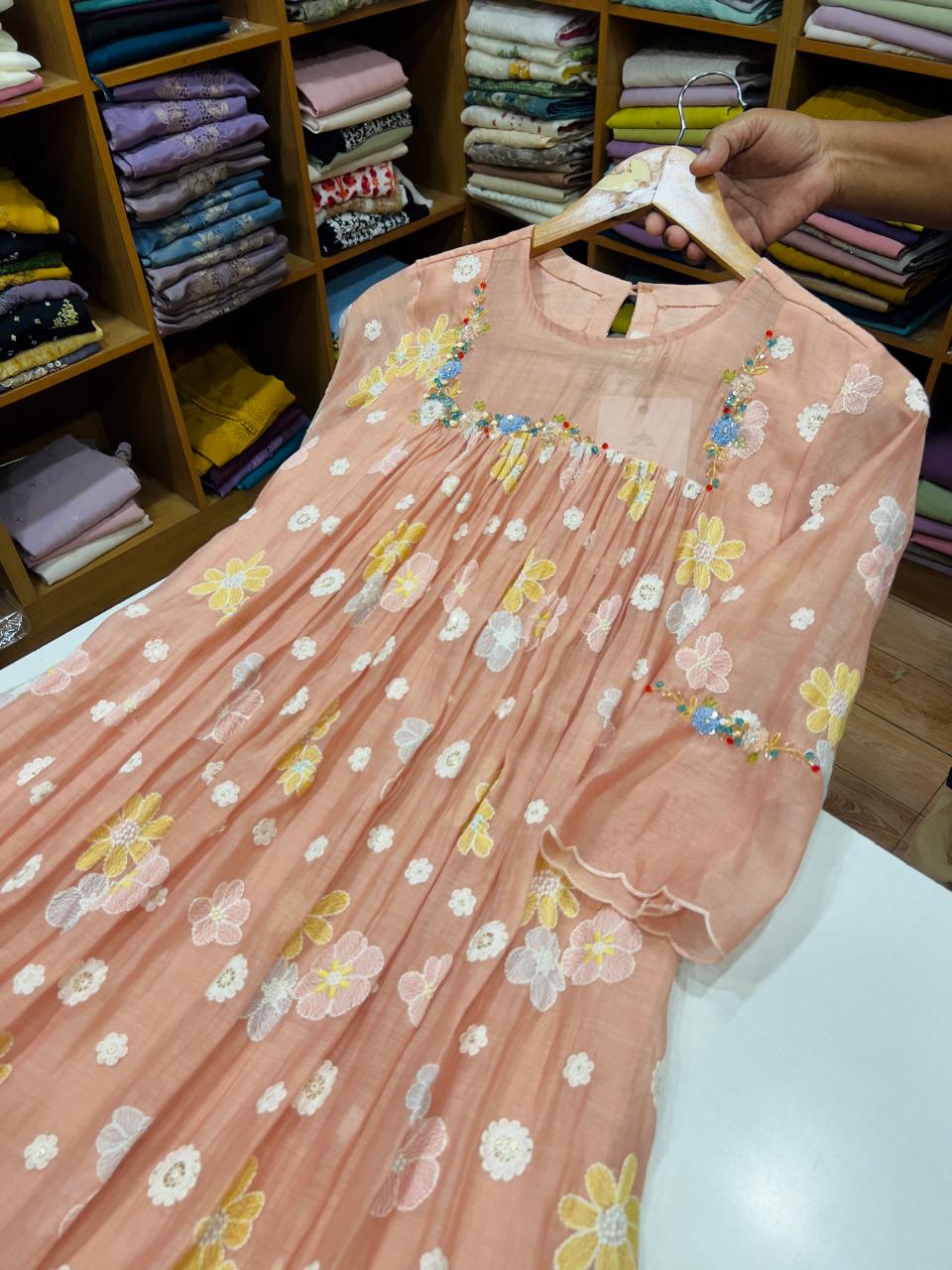 68781ff6-05a1-471b-bbbc-810f7b621f4f N5391 Embroidered Mul Chanderi ( peach) - Image 1